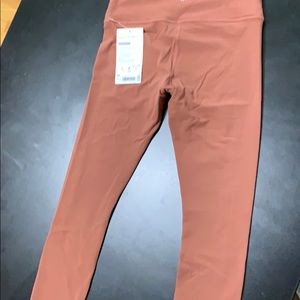 7/8 Elation Rust Athleta tight NWT
